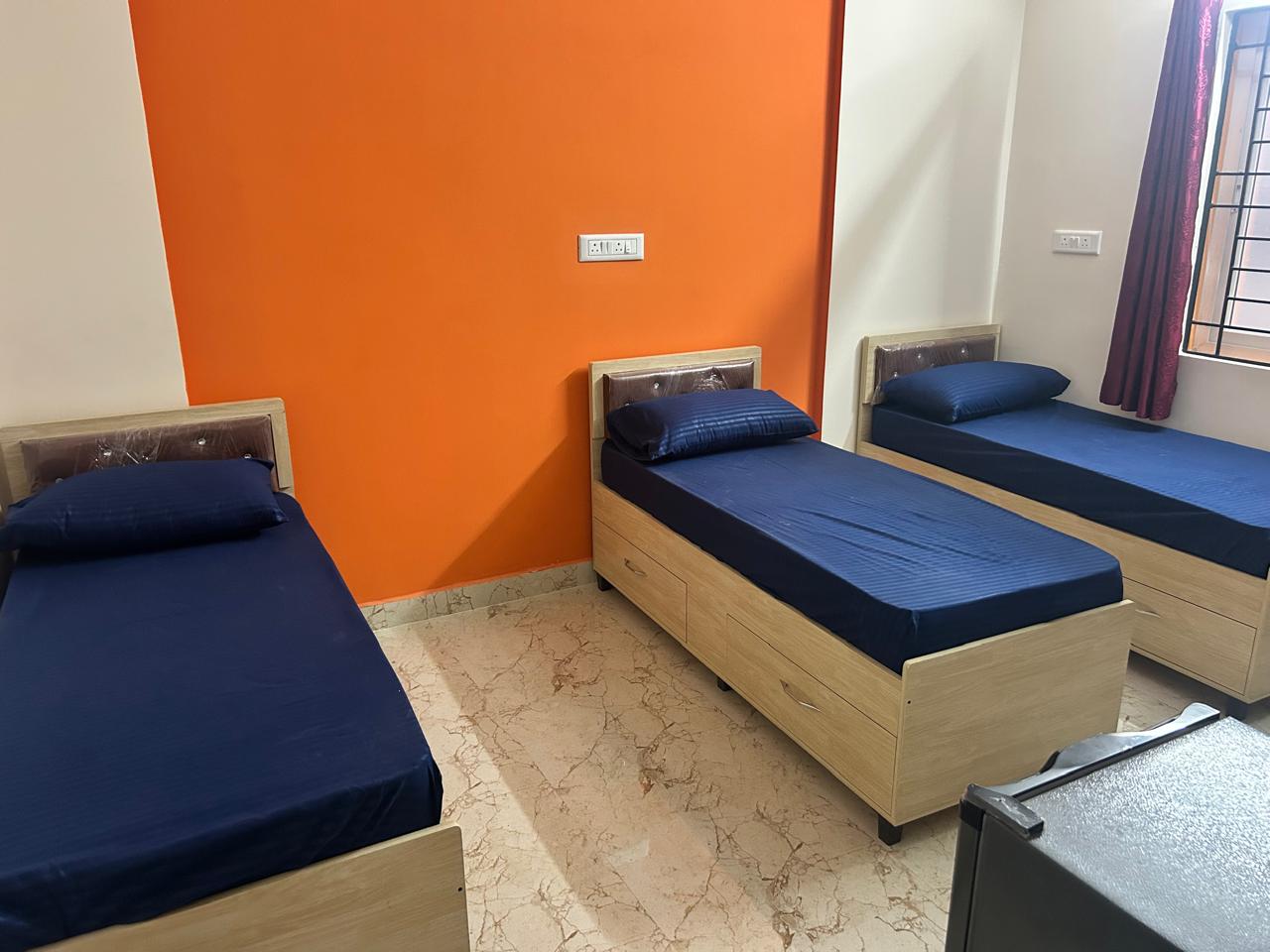 Rest and Roam Co-Live triple sharing style room