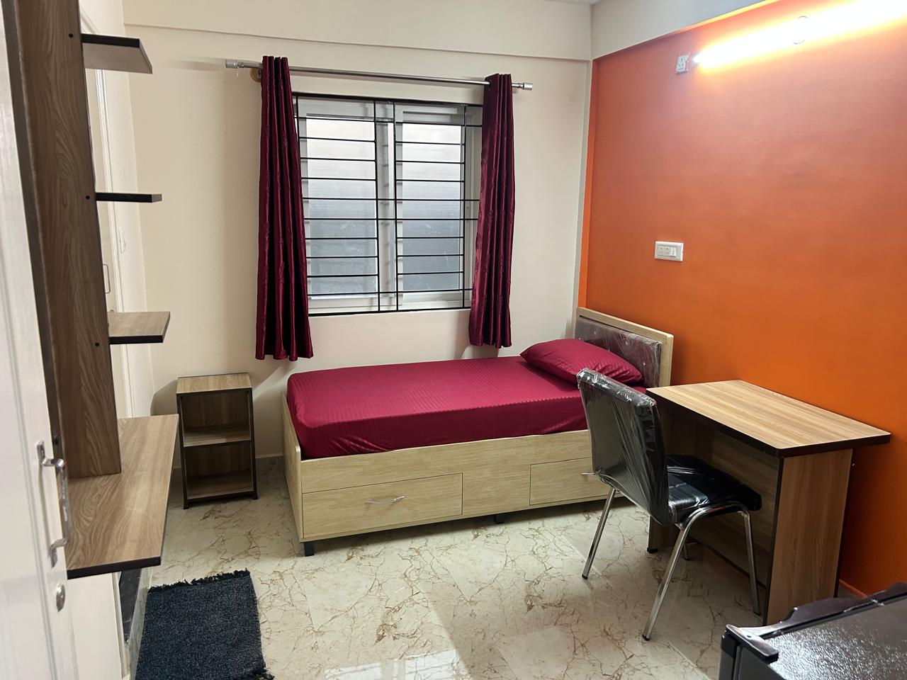 Rest and Roam Co-Live single sharing room with study table